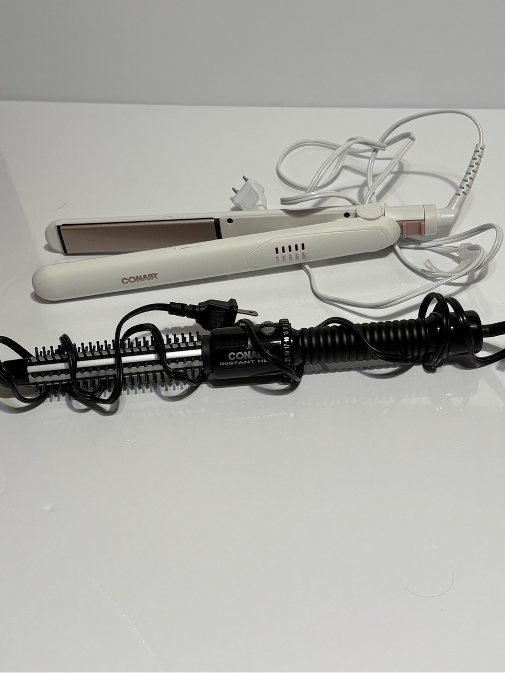 Bundle: 1 Conair White Hair Straightener and round heating brush.